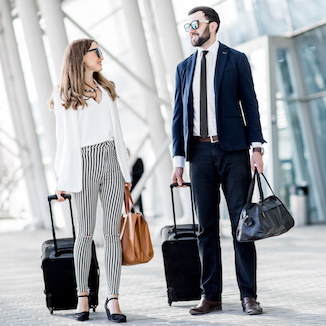 Business couple near the airport
